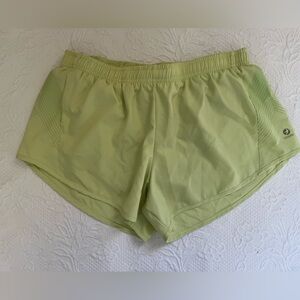 Oiselle light green running shorts with liner size 6